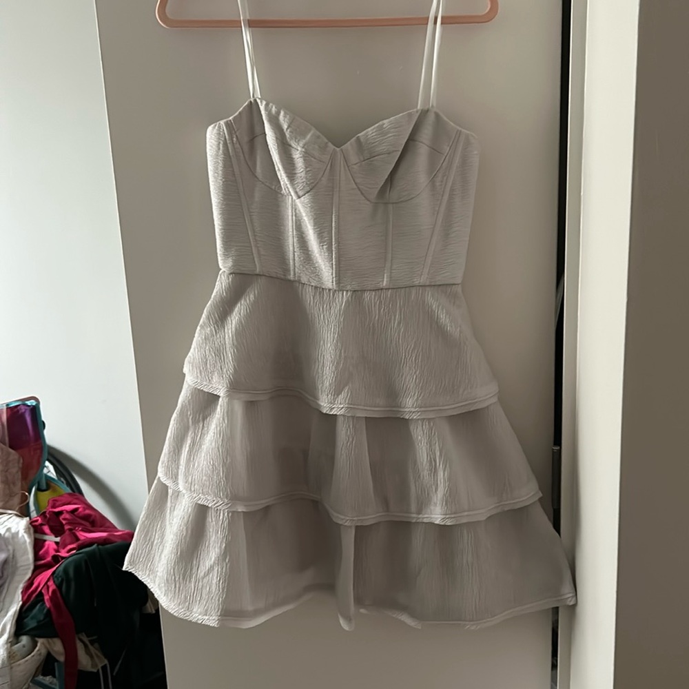 Off white strapless BCBG dress.